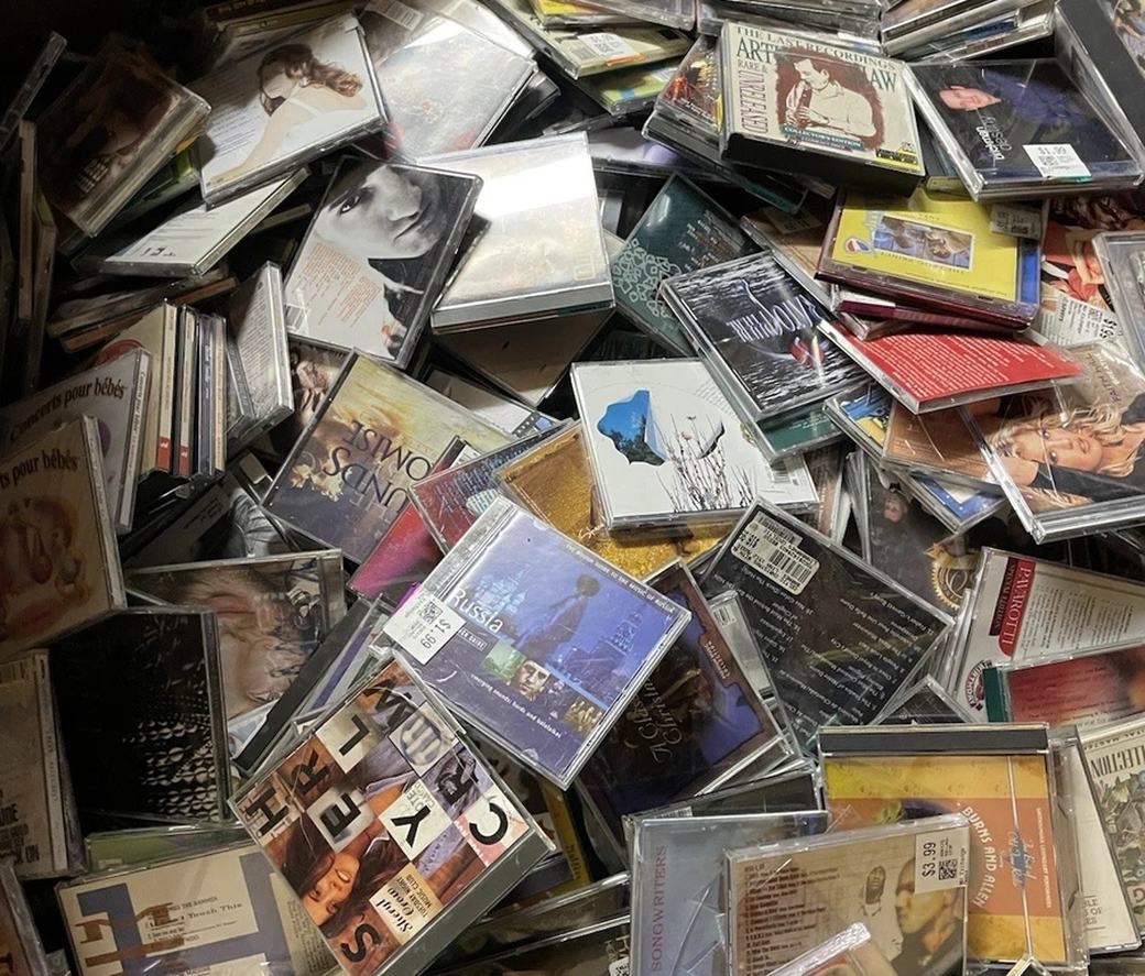 Bin of loose thrift store CDs including classical, easy listening and chart pop, the kind of bulk CD lot Found Sound Records generally does not buy